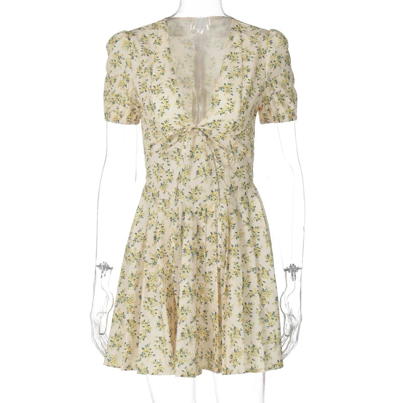 Hugcitar 2026 Floral Print V Neck Short Sleeve Lace Up Zip Up Sexy Slim Pleated Mini Dress Summer Elegant Outfits Party Vacation