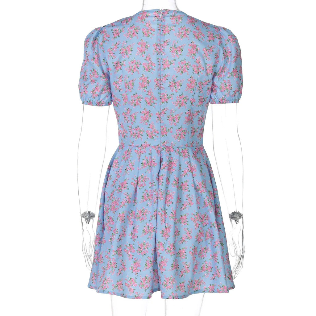 Hugcitar 2026 Floral Print V Neck Short Sleeve Lace Up Zip Up Sexy Slim Pleated Mini Dress Summer Elegant Outfits Party Vacation
